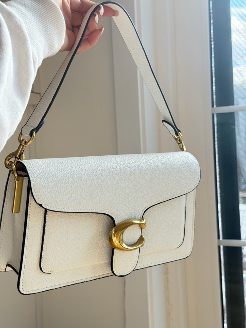 Coach White Leather Shoulder Bag with Black Trim and Gold Hardware